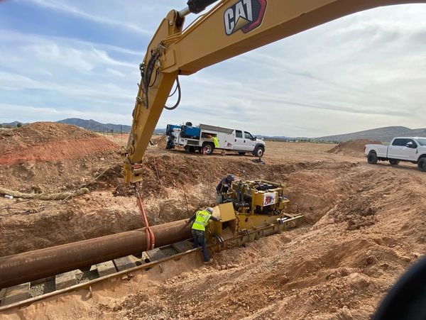 Picture of a work vehicle doing construction services