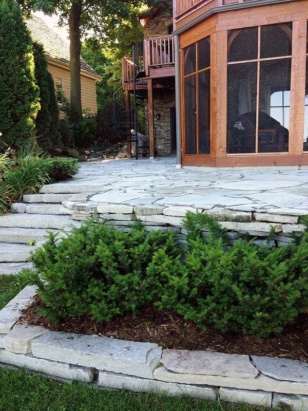 Lannon stone patio installed by Aspen Ridge Tree Service