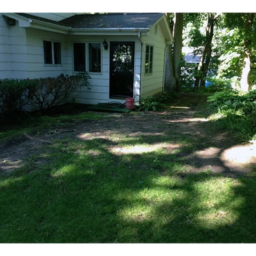 Patio before area of grass