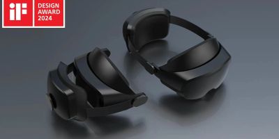 Three sleek black VR headsets on a gray surface with iF Design Award 2024 logo.