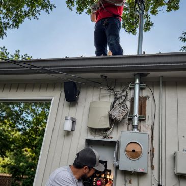 A1-Tex Electric technicians working on a residential electrical service upgrade with meter equipment