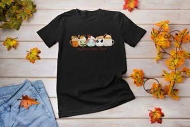 Black t-shirt with cute Halloween-themed coffee cups design.