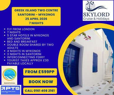 White washed Greek Island Cottage with blue door