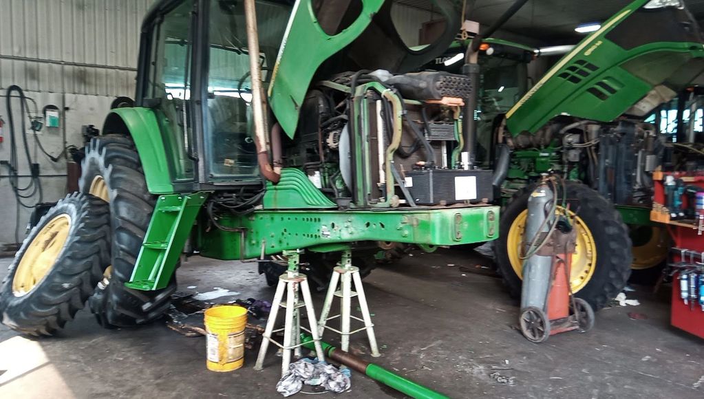 JD 7130 front axle, new ball joints, steering cylinder rebuild, knuckle bearings.