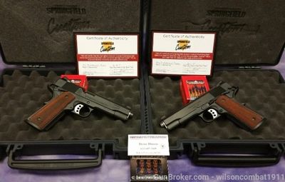 Two Springfield Custom pistols in protective cases with certificates and ammunition.