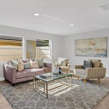 Sparkling clean and staged living room during a bi weekly cleaning by On Deck Cleaning Co.