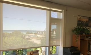 Roller shade blinds in a window in Kincardine