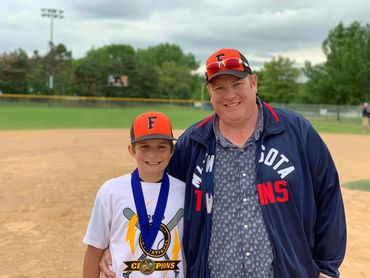 Ethan and I at the baseball field after the tournament.