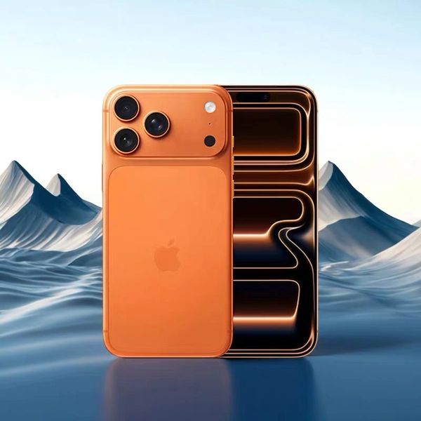 Orange iPhone with triple camera setup against a mountain landscape backdrop.