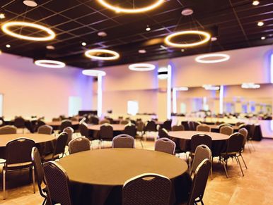 event space with round tables and chairs