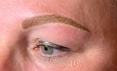 Microblading combination brows near me on person with alopecia
