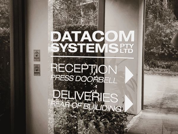 Custom Window Graphics Directional Signage in Norwest Business Park by Kellyville Signs