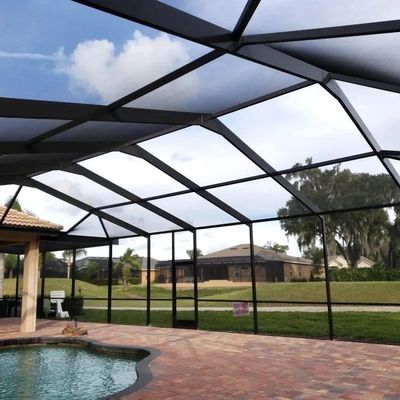 Harmon's Services Aluminum Construction Polk County, Fl. Custom Gable Hip Pool Enclosure.