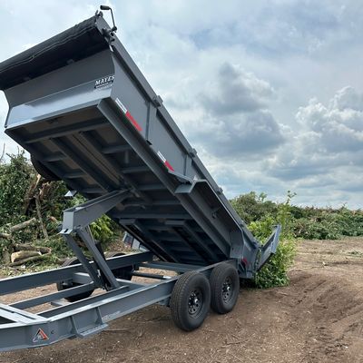 Our 7x14 Dump Trailer With A Load Of Brush
