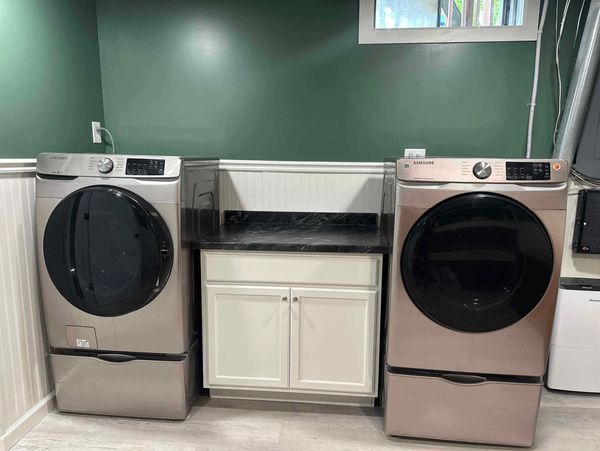 Laundry room upgrade vanity lighting flooring drywall paint beadboard countertop window licensed