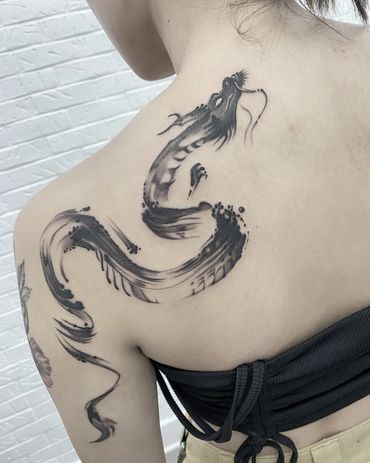 Japanese style tattoo, dragon tattoo, fine line tattoo by Jason Nicholson tattoos in west chester Pe