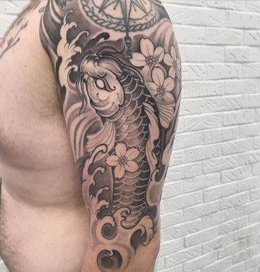 Japanese koi fish tattoo by Jason Nicholson tattoos in west chester pa 