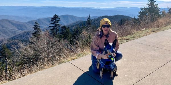 TK with her dog in the Smoky Mountains.