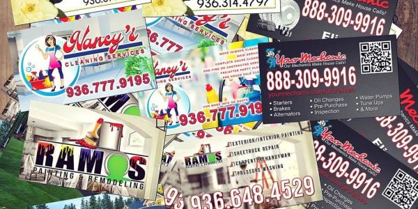 Various business cards for local services.
