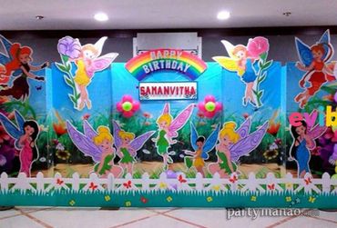 Colorful fairy-themed birthday decoration with a rainbow and name Samanvitha.