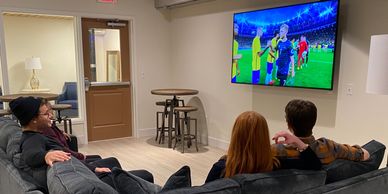 Need a place to watch the game? Relax in our first floor community room!

