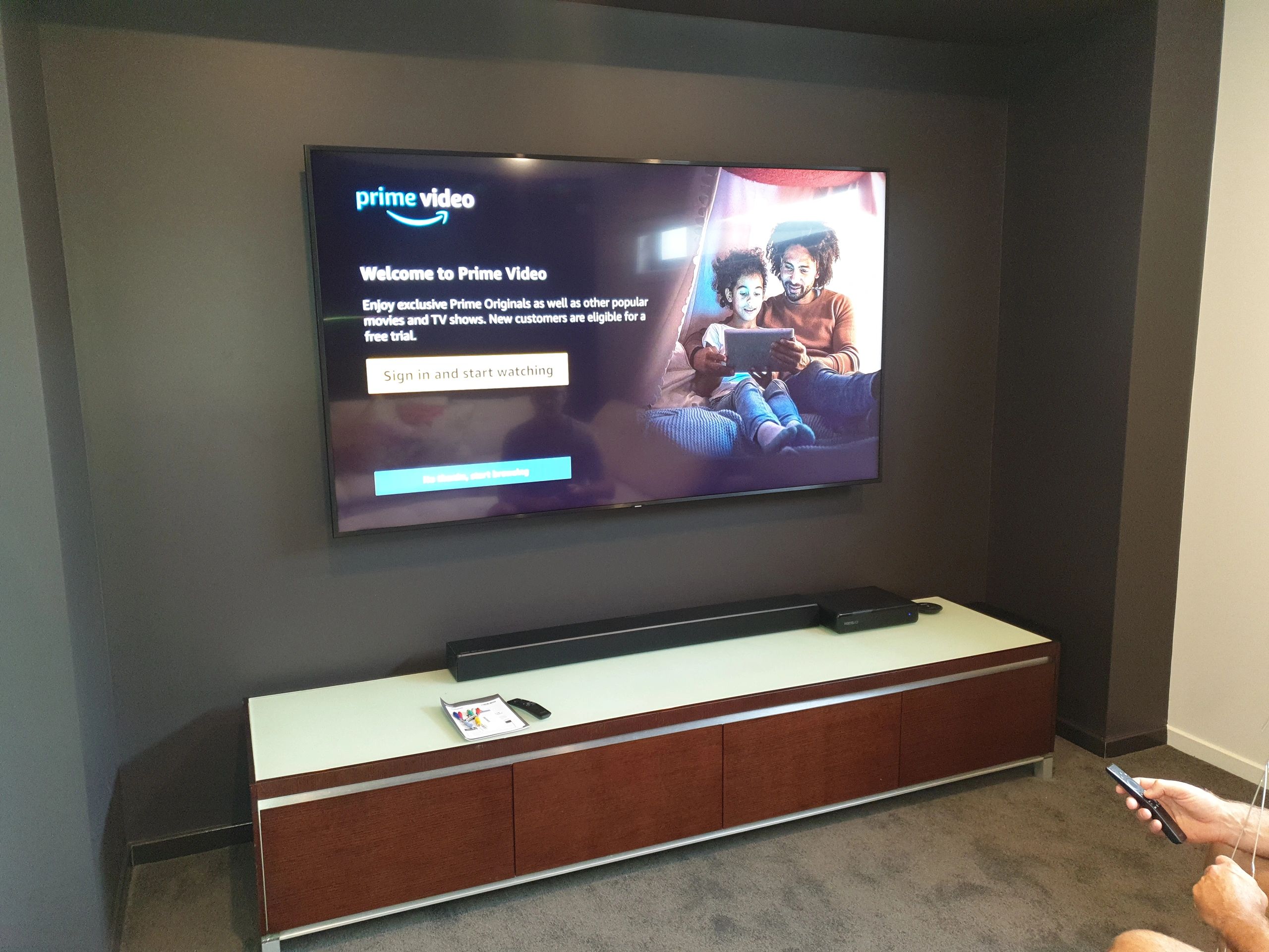 82” Samsung tv wall mounted with all cables concealed through wall.