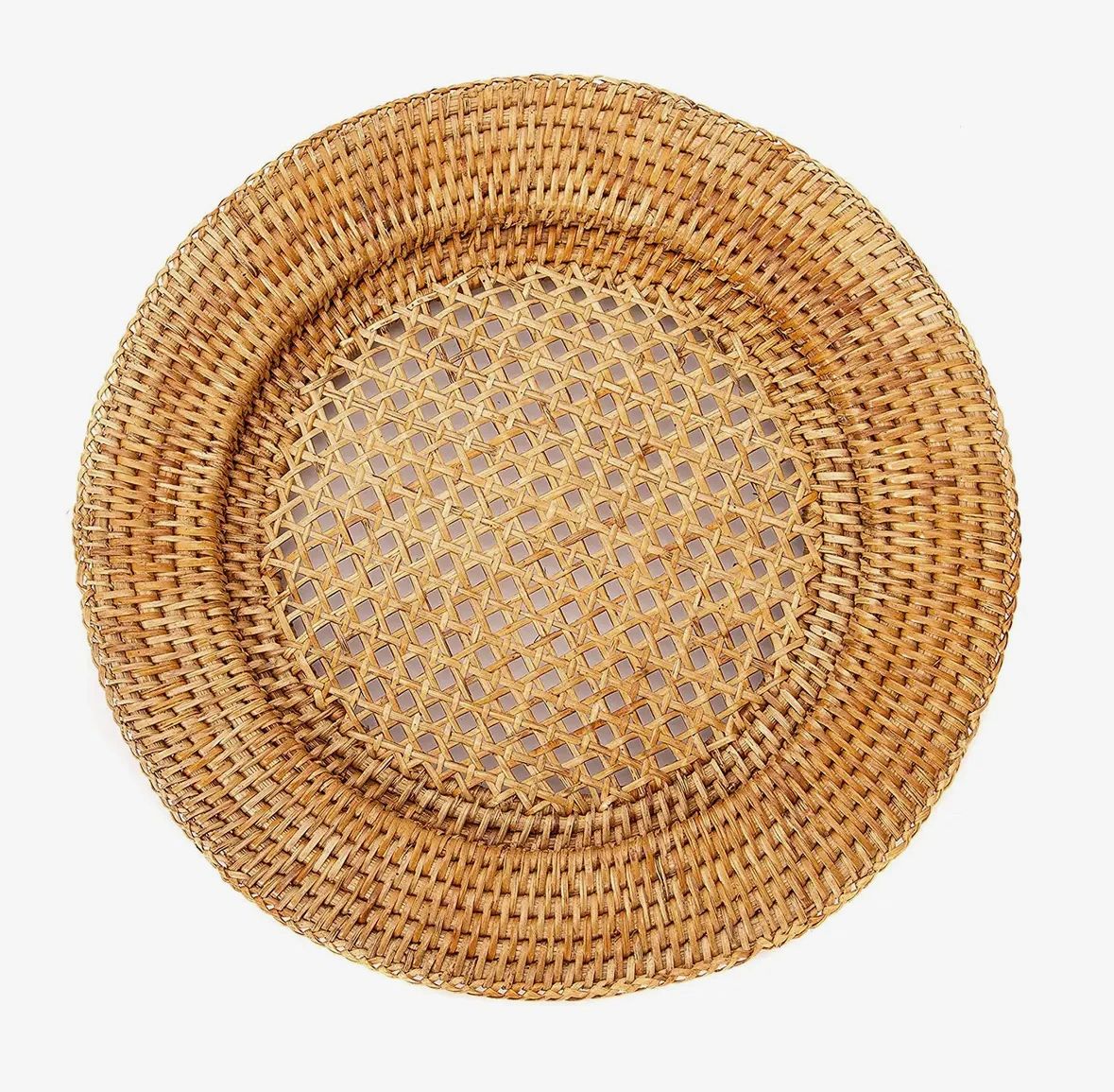 Round woven rattan placemat with intricate pattern.