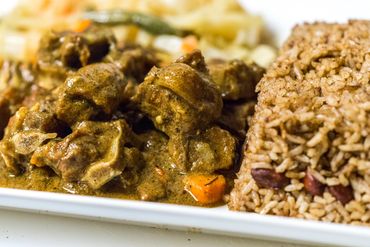 closeup shot of a plate with curry and rice
