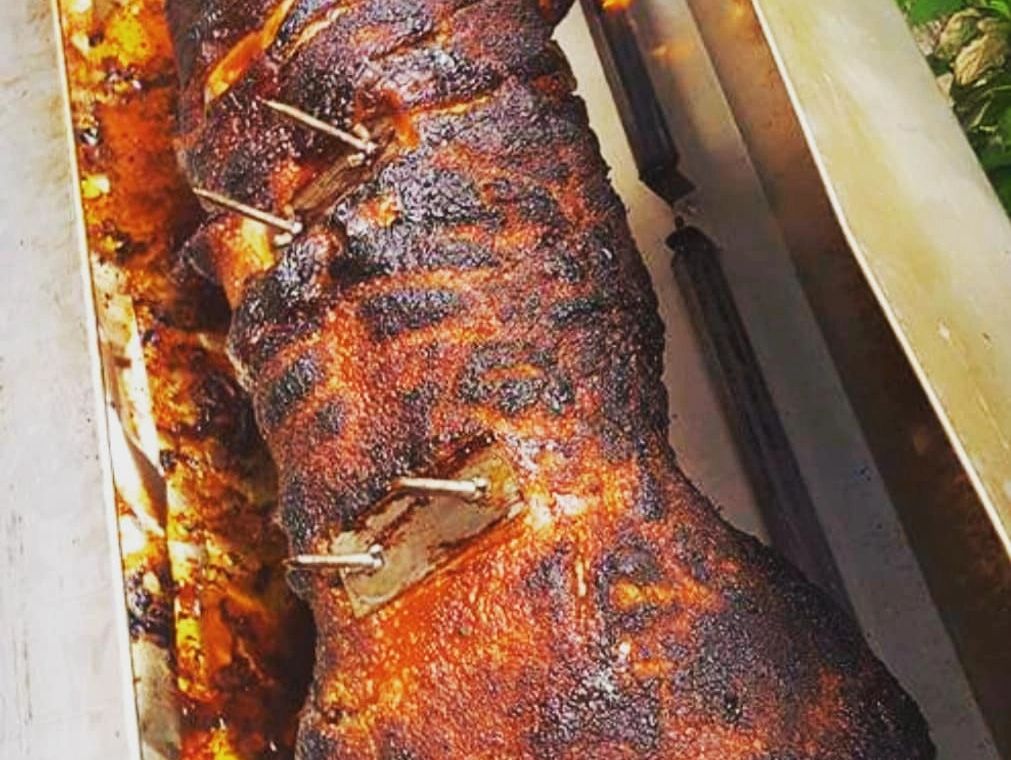 Hogroast with crispy crackling served witg baps, apple sauce sage and onion stuffing