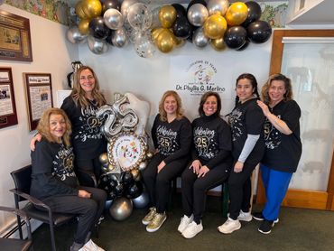 Group photo of Dr. Merlino and staff