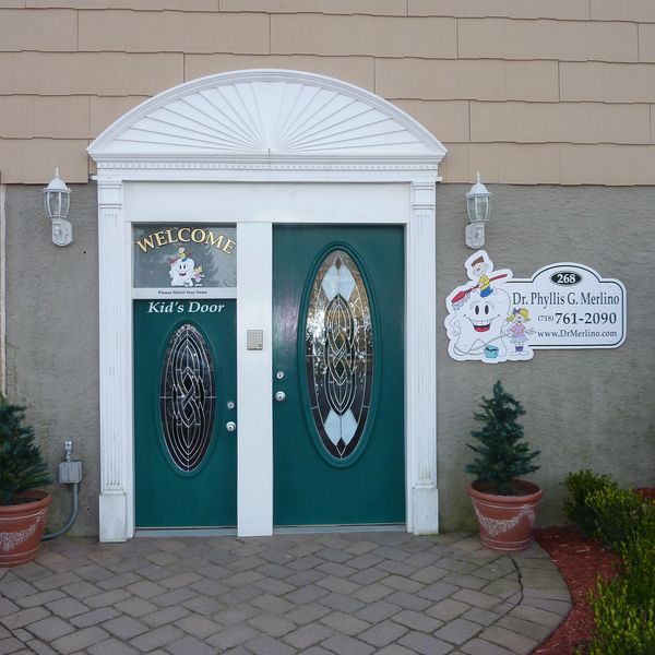 front entrance with large door and miniature kids door