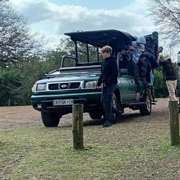 Game Drive Safari vehicle parked for lunch with group.