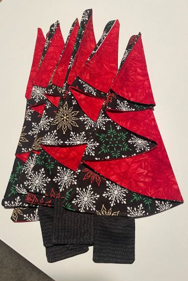 Christmas-themed fabric tree decorations.