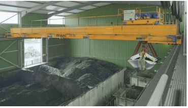 Overhead Crane with Demag Wirerope Hoist, Conductor Bar System and Runway. Below the hook Grapple