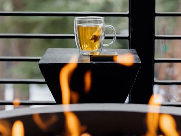 Relaxing by a firepit at a luxury vacation rental near lake tahoe
