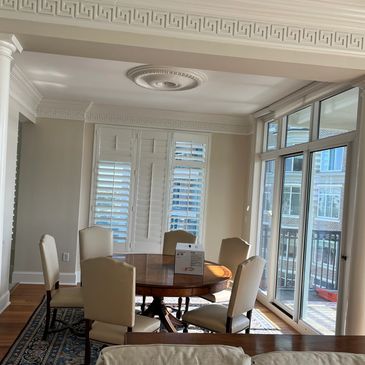 Painting of shadders, trim and walls of an apartment.