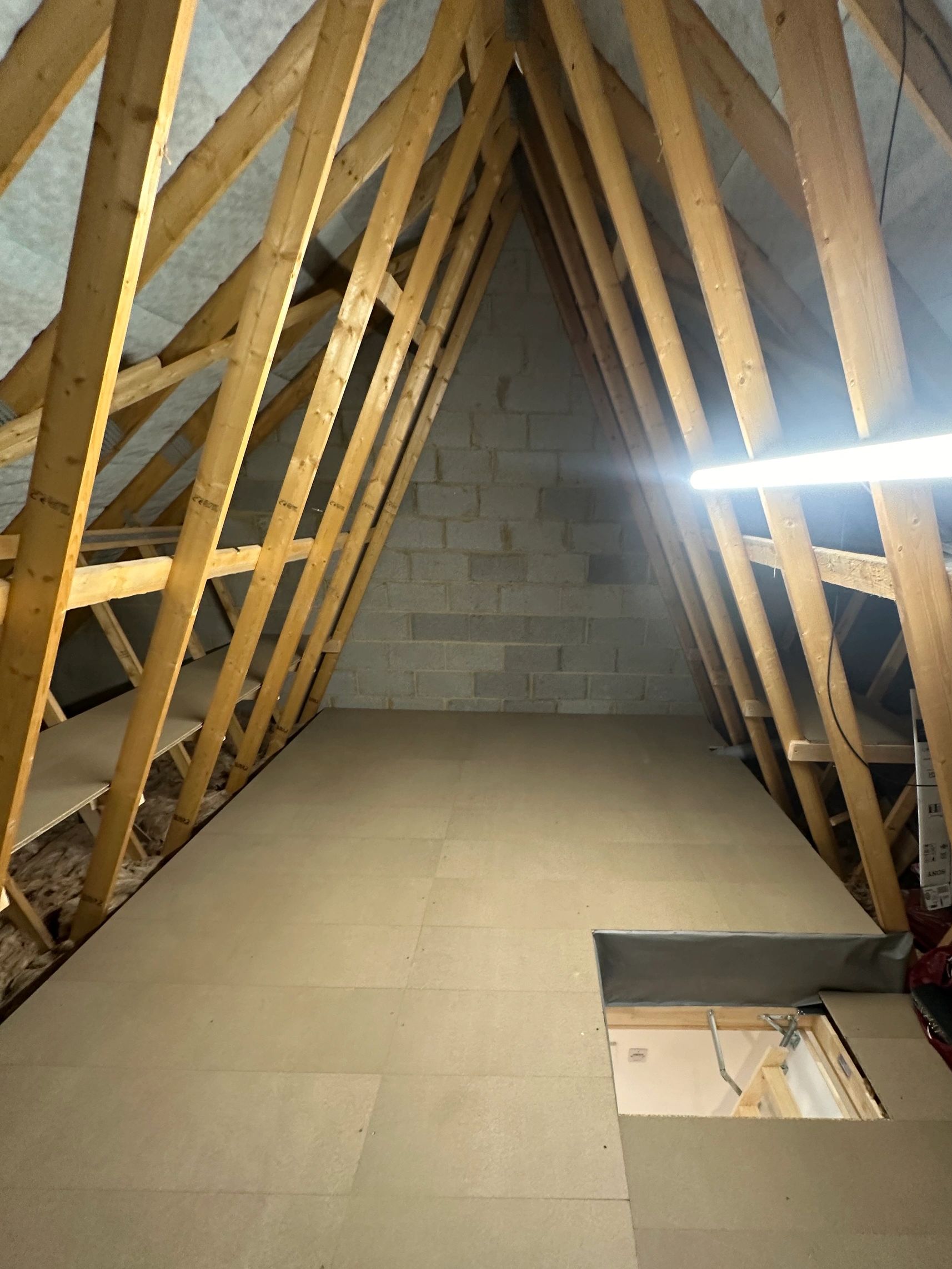 Loft boarding a typical new build trussed loft 
#loftboarding