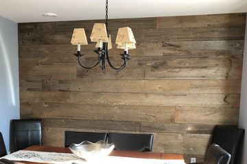century old barn board for feature wall in dining room