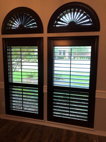 Plantation shutters with eyebrow arch