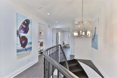 DARK GARY LVP FLOORING WITH NEW 7" BASE AND CROWN IN HALLWAY SECOND FLOOR MAYS LANDING NJ