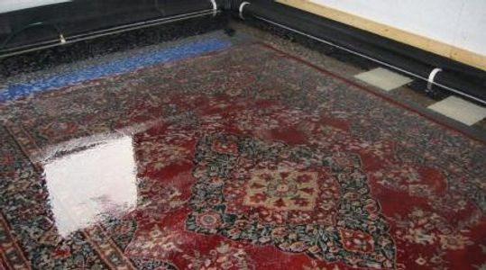 soaking rug, sanitizing rug flood water damaged rug soaking and cleaning. getting rid of mildew mold