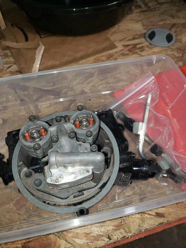 Rebuilt TBI Throttle body injection assembly after service.