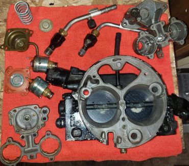 TBI Throttle Body Injection assembly broken down during service.