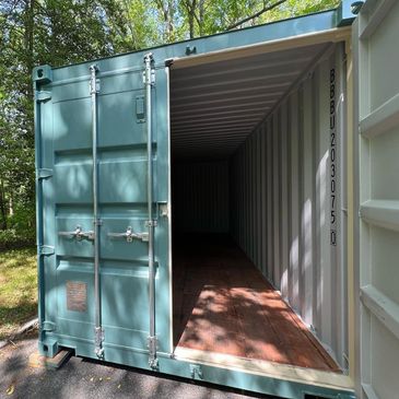 <img alt= "photo of 20 foot container with one door open" src="hq.jpg">