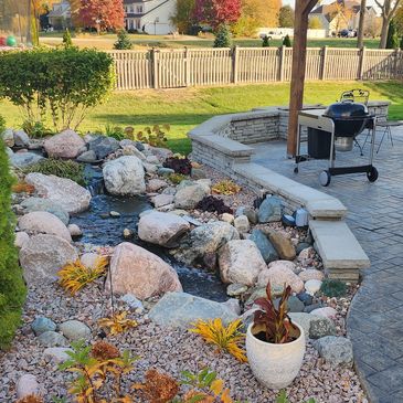A pondless waterfall without the pond.  Maintenance and installation offered