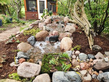 8' Pondless waterfall to provide a watering hole for the birds and wildlife.