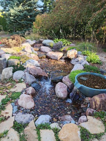 The sound and movement of flowing water add a  visually pleasing element to any outdoor space.