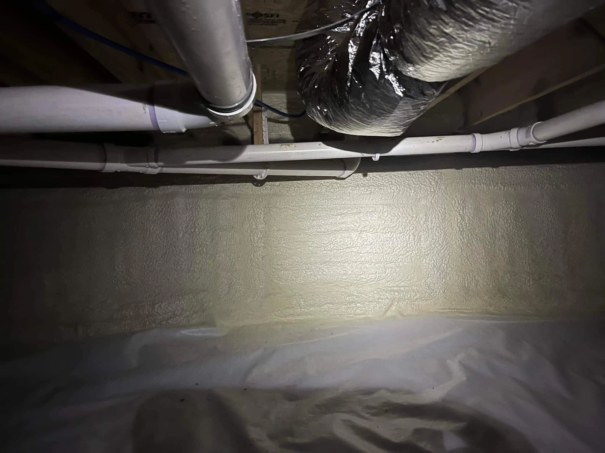 Crawlspace with ground vapor barrier and insulated walls by Elite Contractor Services LLC