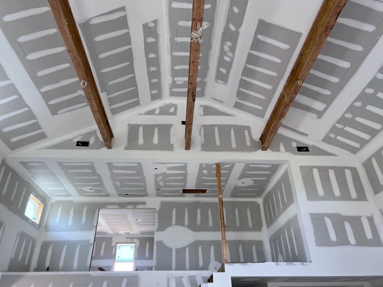 Drywall installation on walls and a cathedral ceiling by Elite Contractor Services LLC