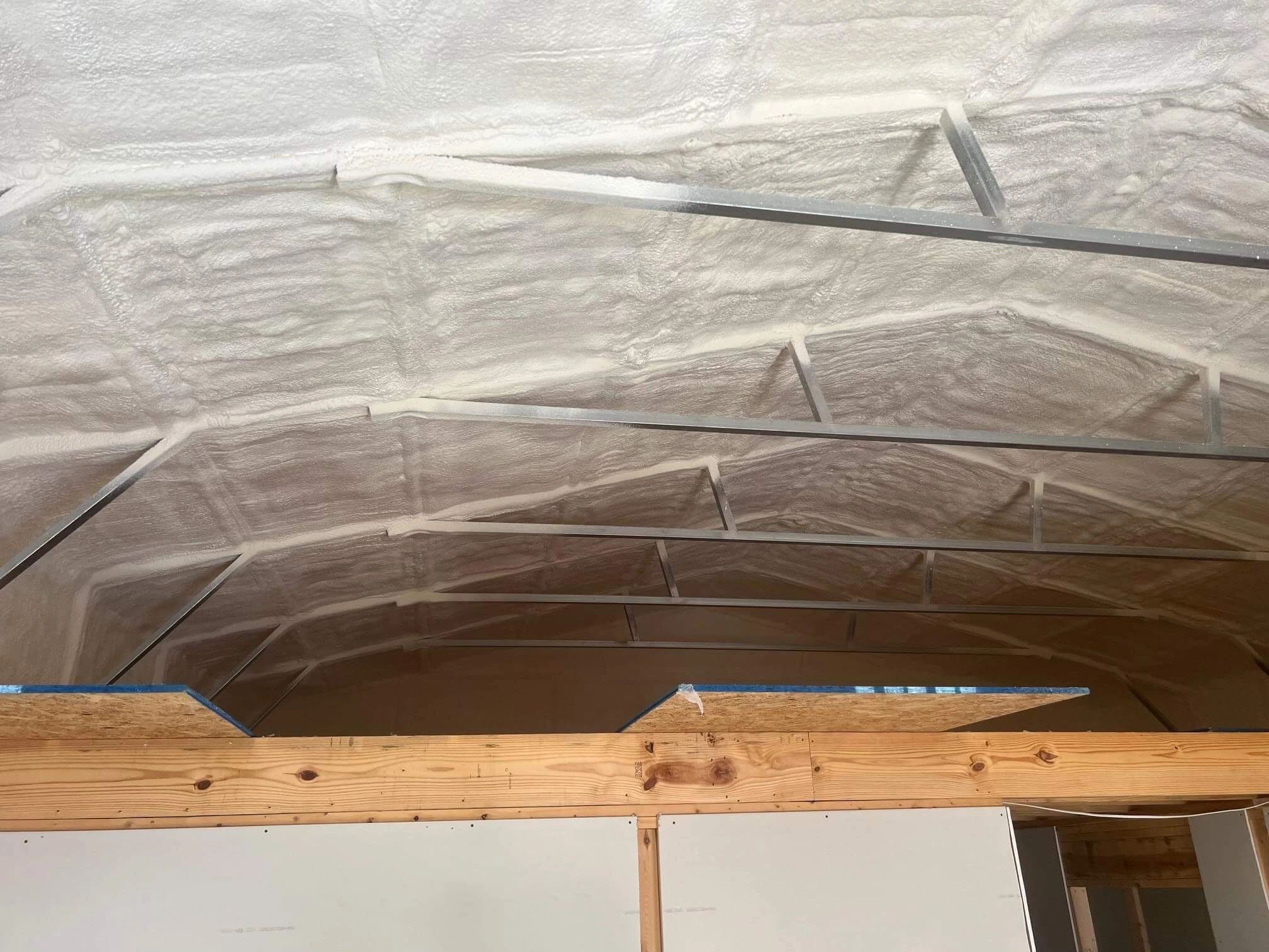 Spray foam insulation on a Tennessee roof deck by Elite Contractor Services LLC